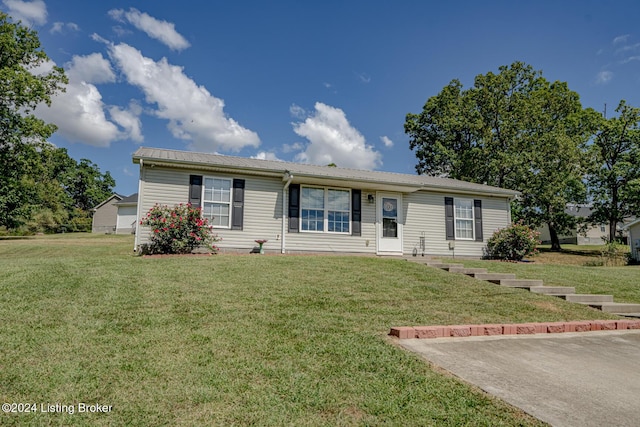 ranch-style house with a front lawn