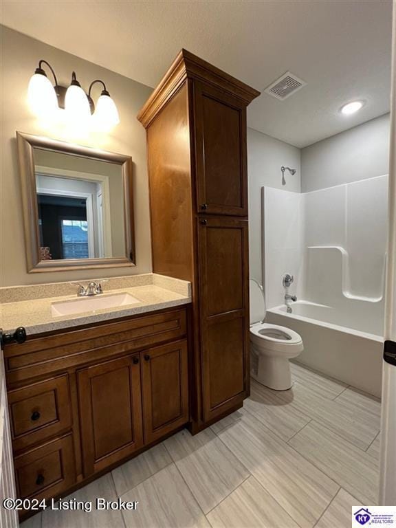 full bathroom featuring vanity, toilet, and bathtub / shower combination