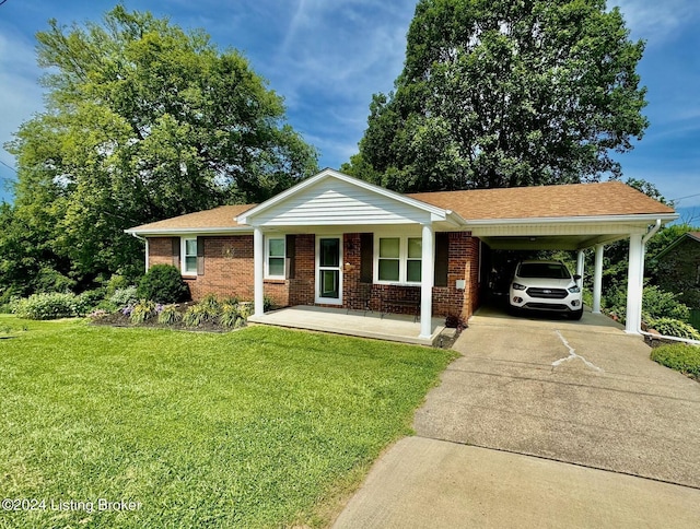 ranch-style home with a carport, a porch, and a front lawn