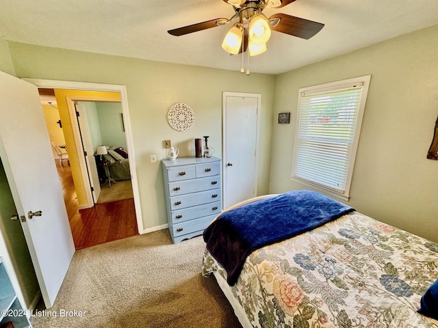 bedroom featuring carpet flooring and ceiling fan