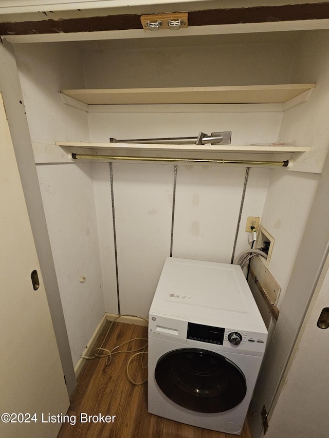 laundry room with washer / clothes dryer and dark hardwood / wood-style flooring