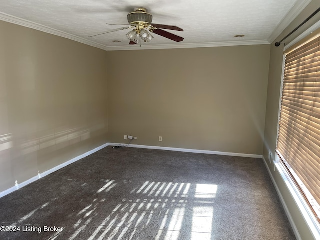 carpeted empty room with ceiling fan, a textured ceiling, and ornamental molding