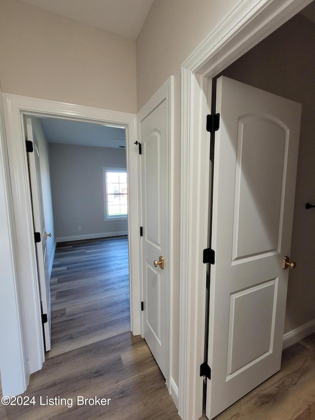 hallway featuring hardwood / wood-style floors