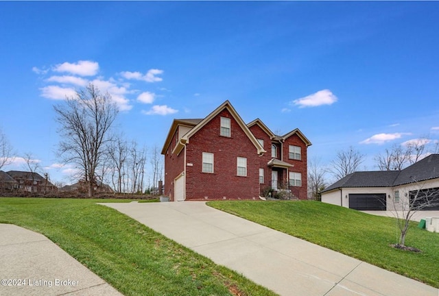 view of front facade featuring a front lawn and a garage