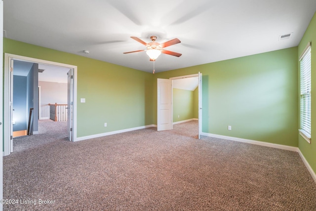 unfurnished bedroom with carpet and ceiling fan