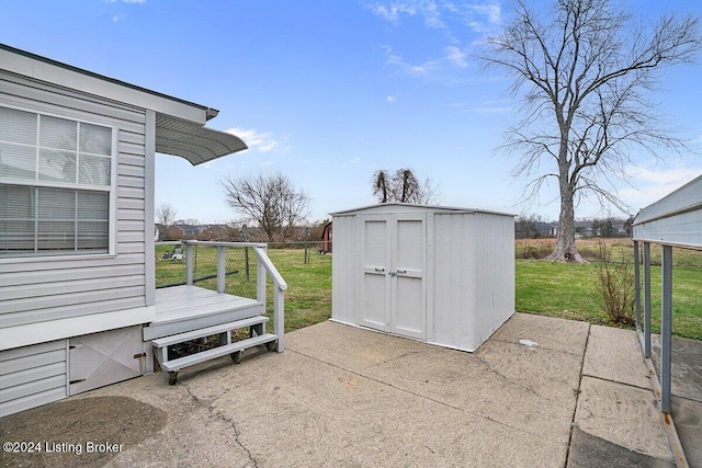 view of patio featuring a shed