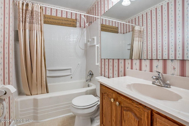 full bathroom featuring shower / bath combo, vanity, and toilet