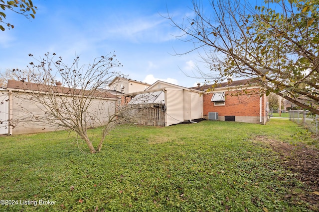 view of yard featuring central AC