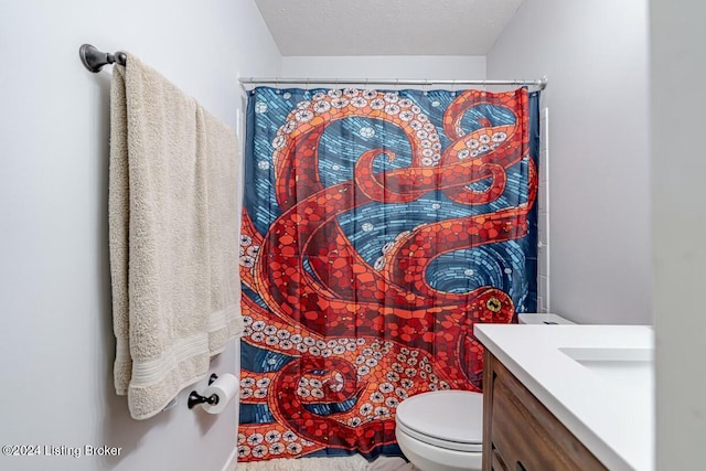 bathroom with vanity, a textured ceiling, toilet, and a shower with shower curtain