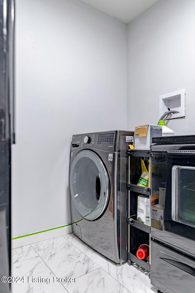 laundry room featuring washer / clothes dryer