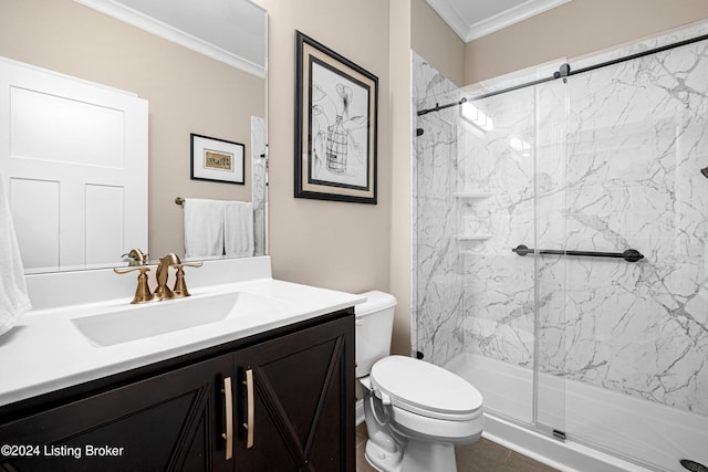 bathroom with vanity, a shower with door, crown molding, tile patterned flooring, and toilet