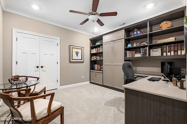 office area featuring light carpet, ceiling fan, and ornamental molding