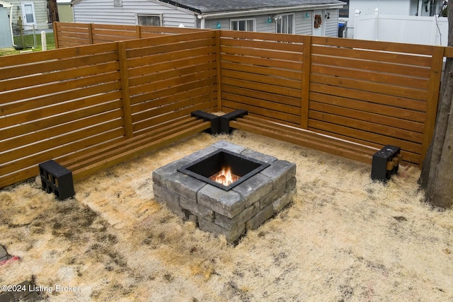 exterior space featuring a fire pit