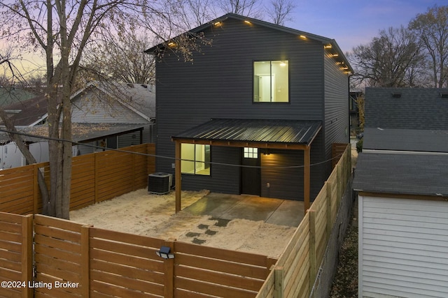 view of front of home with cooling unit