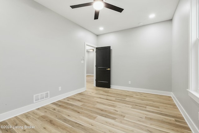 unfurnished room with light hardwood / wood-style flooring and ceiling fan