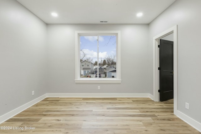 empty room featuring light hardwood / wood-style floors