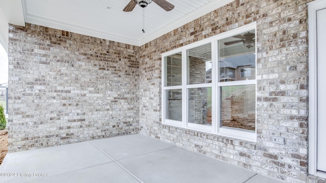 view of patio / terrace featuring ceiling fan