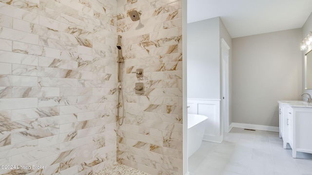 bathroom featuring tile patterned flooring, vanity, and independent shower and bath