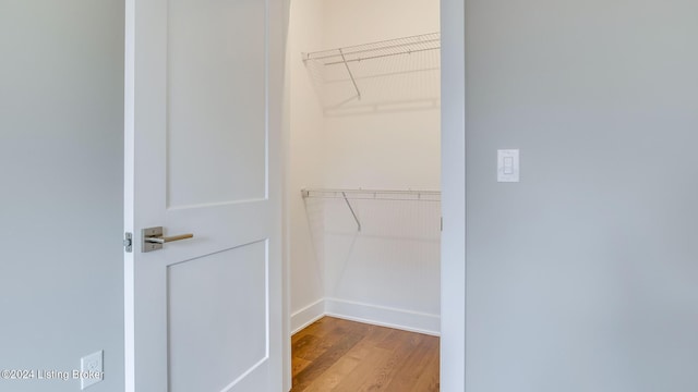 walk in closet featuring wood-type flooring