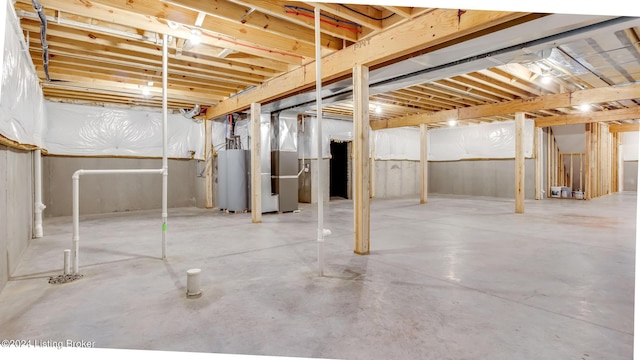 basement featuring gas water heater