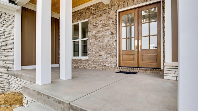 entrance to property featuring french doors