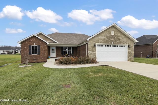 view of front facade featuring a front lawn and a garage