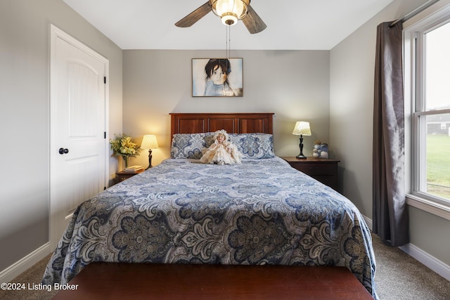 carpeted bedroom featuring ceiling fan