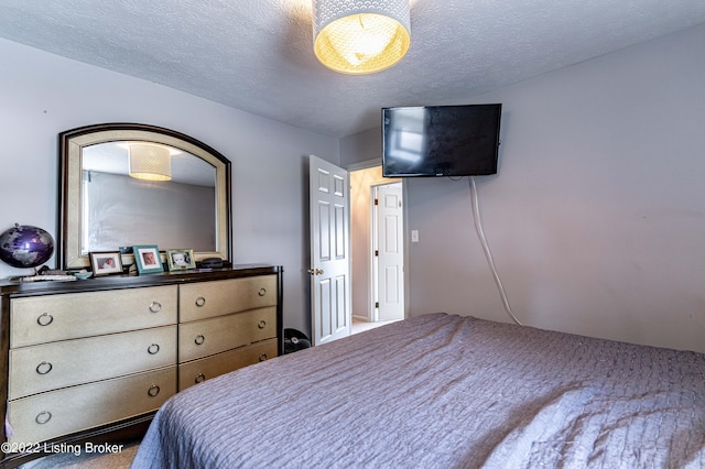 bedroom with a textured ceiling