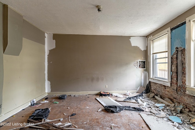 miscellaneous room featuring a textured ceiling