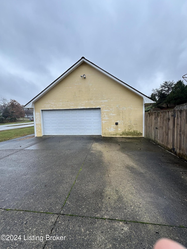 view of side of home with a garage