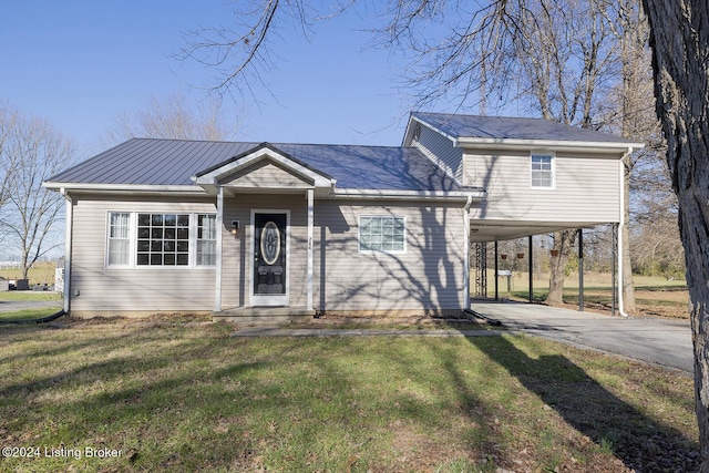 view of front facade with a front lawn and a carport