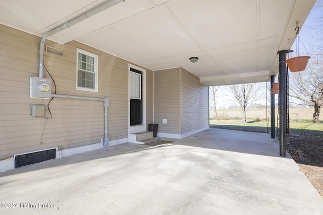 view of patio / terrace with a carport