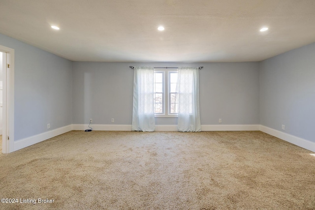 view of carpeted spare room