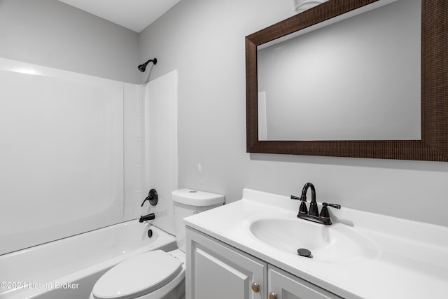 full bathroom with vanity, shower / bath combination, and toilet