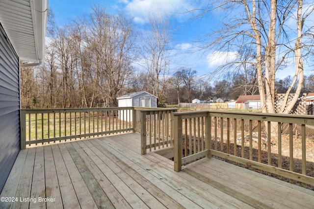 deck featuring a storage shed