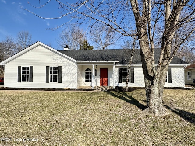 ranch-style house with a chimney, a front yard, and a shingled roof