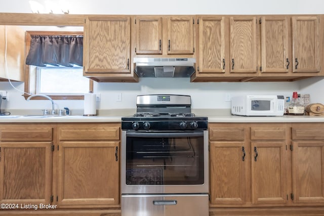 315 Timberlake Ln, Mcdaniels, KY 40152 - kitchen featuring stainless steel gas stove, range hood, white microwave, and light countertops