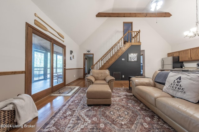 315 Timberlake Ln, Mcdaniels, KY 40152 - living area featuring high vaulted ceiling, stairs, beam ceiling, wood finished floors, and a chandelier