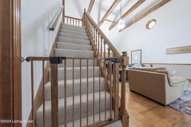 315 Timberlake Ln, Mcdaniels, KY 40152 - stairs featuring beam ceiling and wood finished floors
