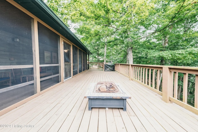 315 Timberlake Ln, Mcdaniels, KY 40152 - wooden deck with a fire pit, a sunroom, and view of scattered trees