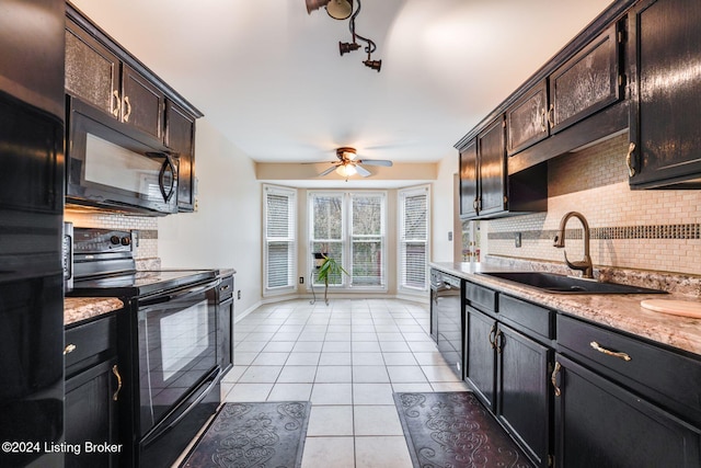 kitchen with dark brown cabinetry, ceiling fan, sink, tasteful backsplash, and black appliances