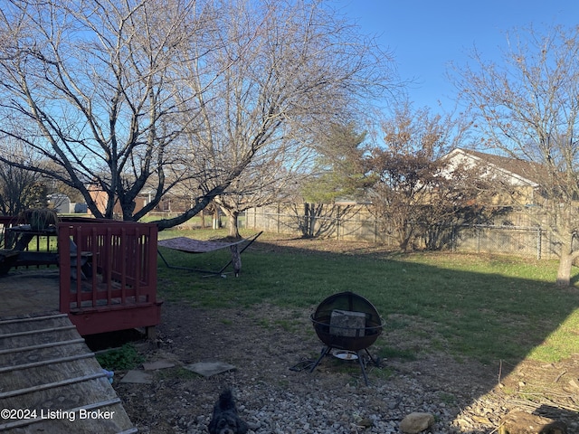 view of yard featuring a fire pit