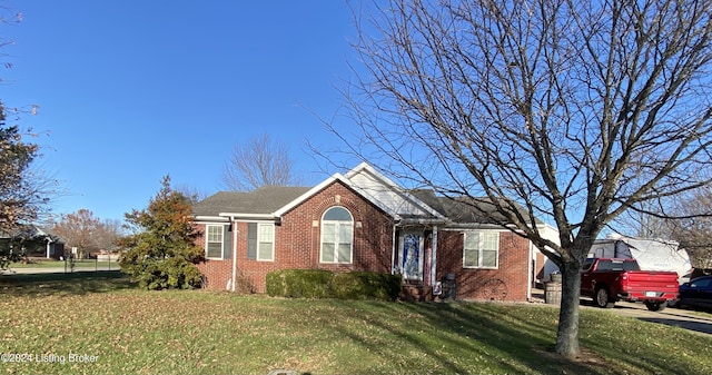 view of front facade with a front yard