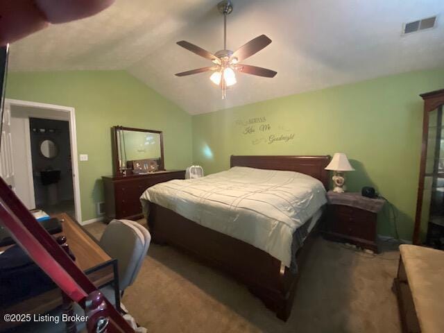 carpeted bedroom featuring vaulted ceiling and ceiling fan