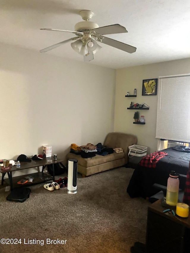 bedroom featuring ceiling fan and carpet floors