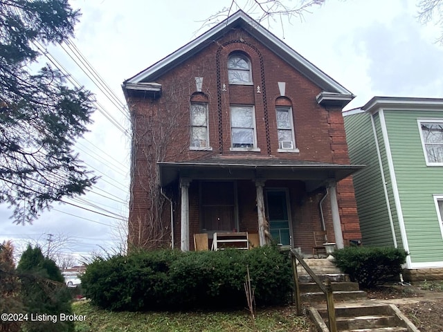 view of property with a porch