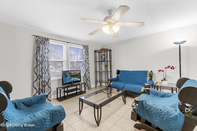 living room featuring ceiling fan and light tile patterned floors