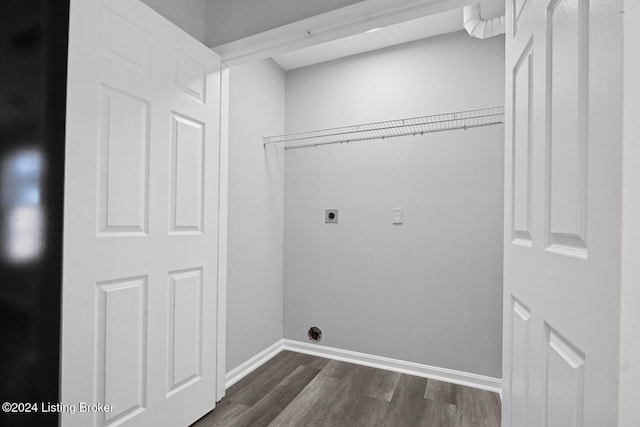 laundry room featuring electric dryer hookup and dark hardwood / wood-style flooring