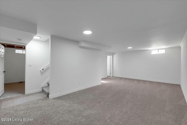 basement with light colored carpet