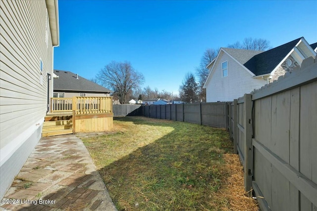 view of yard with a deck